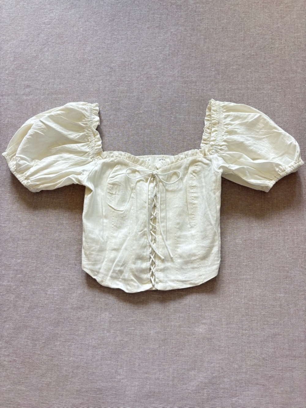 Astr The Label white linen corset top.